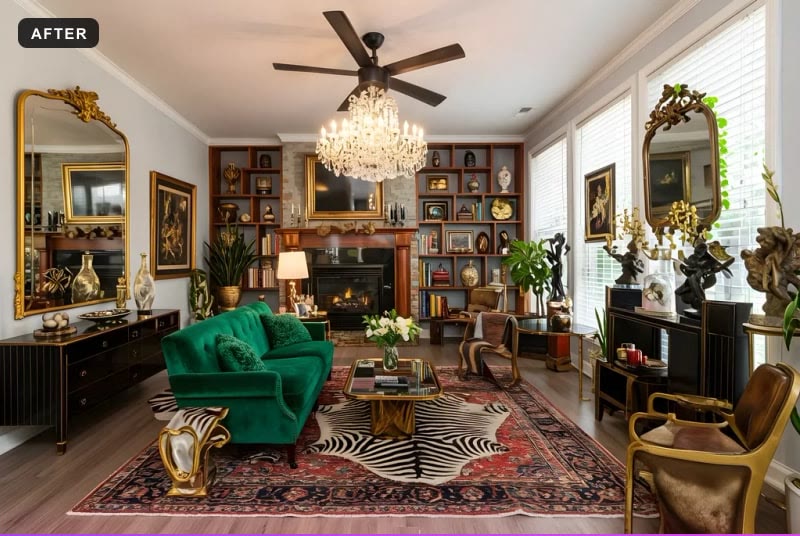 The same living room virtually staged in a Hollywood Regency style: an emerald velvet sofa, a zebra-print rug over a red oriental rug, gilt mirrors, black lacquer cabinets and a crystal chandelier added below the ceiling fan.