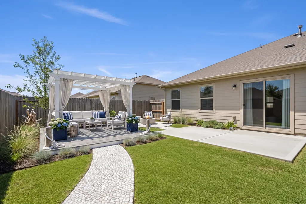 The same backyard after AI virtual staging in the Coastal style
